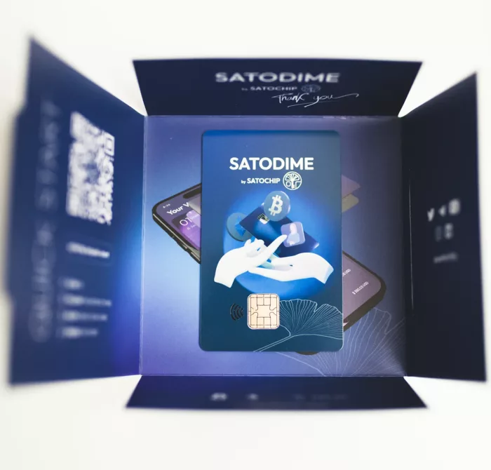 The Satodime bearer crypto card in its packaging